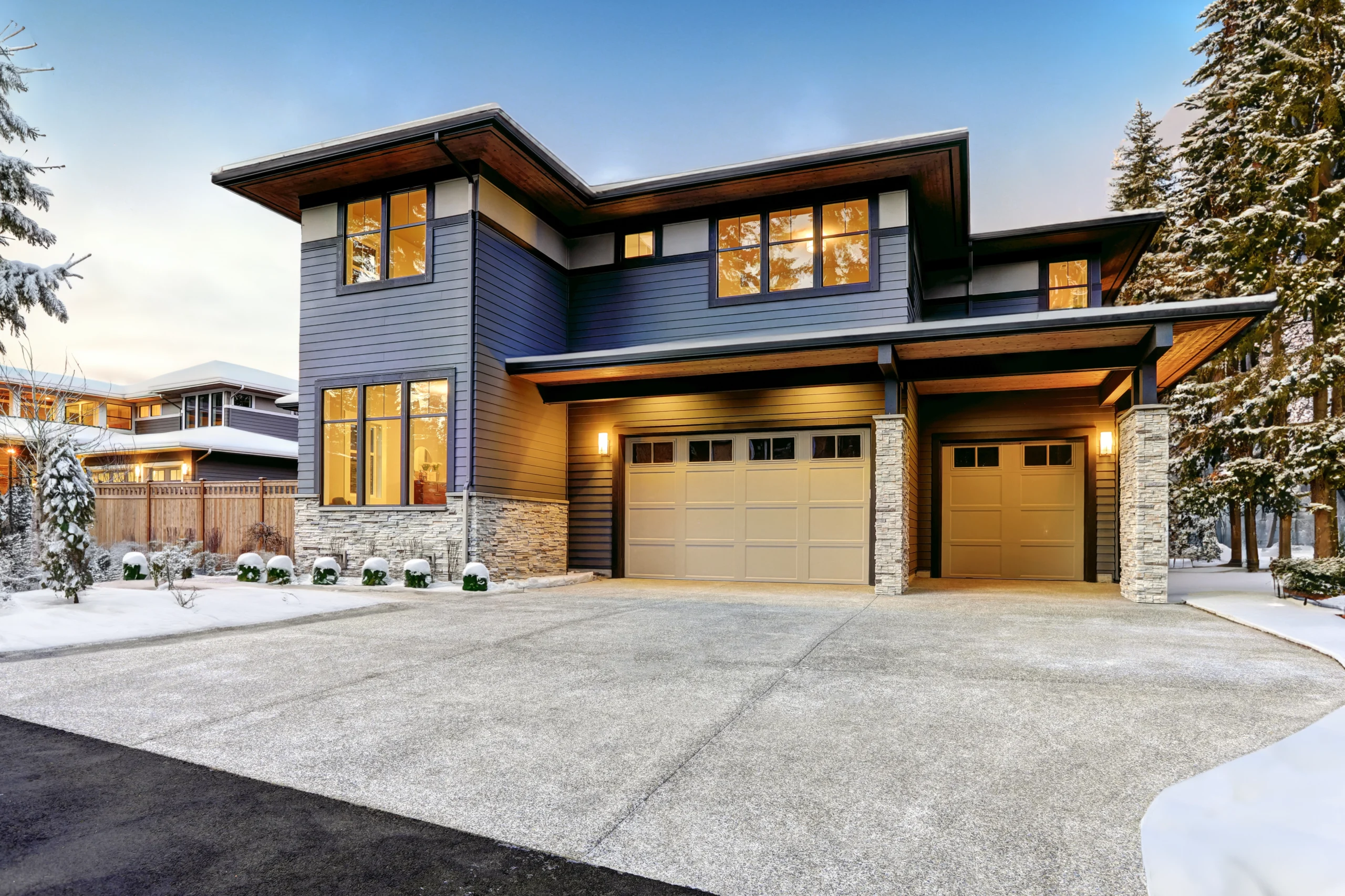 2 tone heated driveway infront of modern home