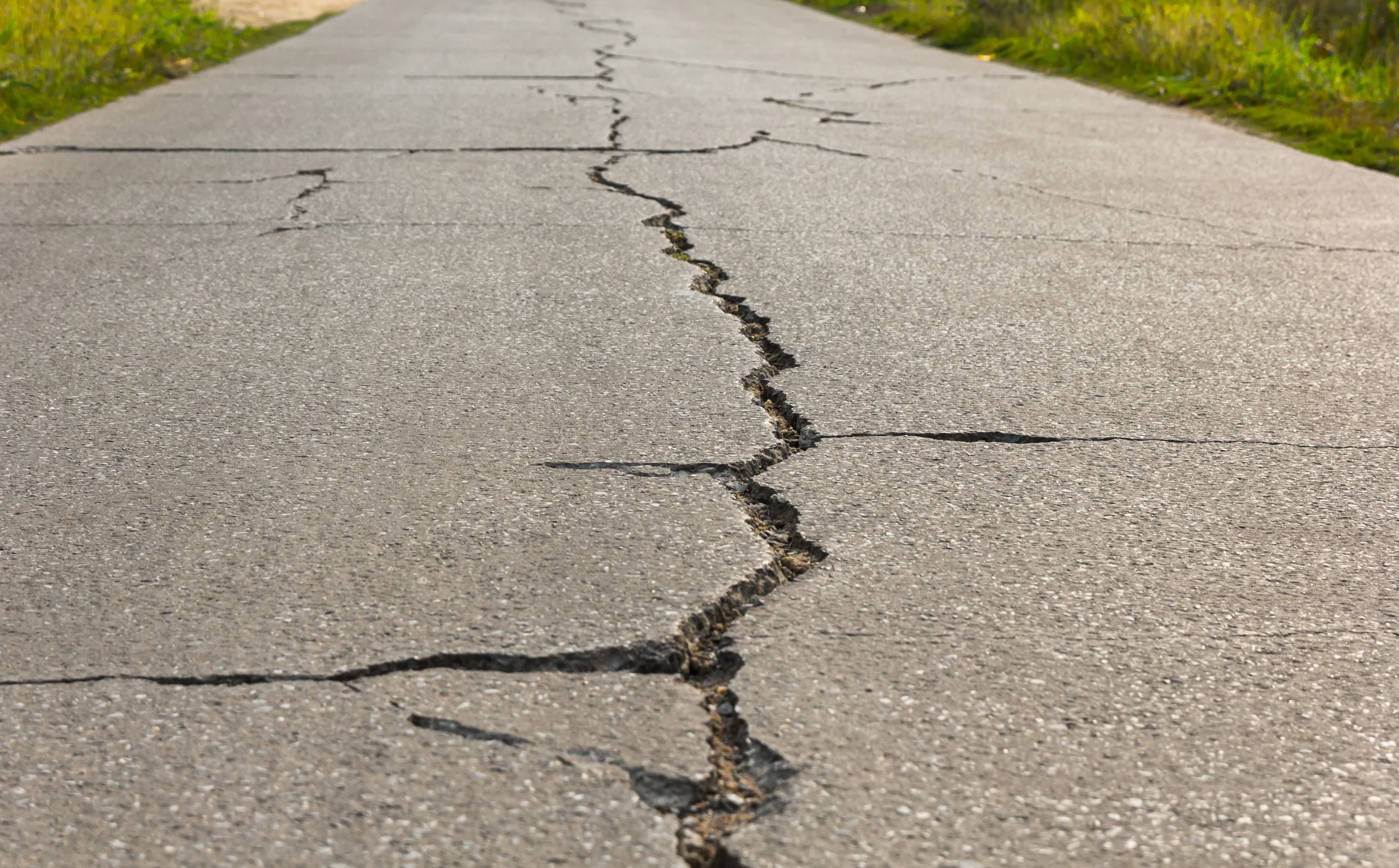 Road covered in large cracks